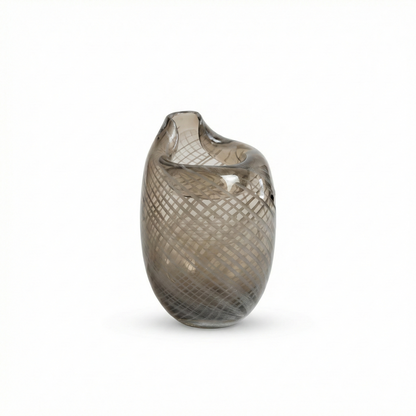 The Ribbed Amber Vessel